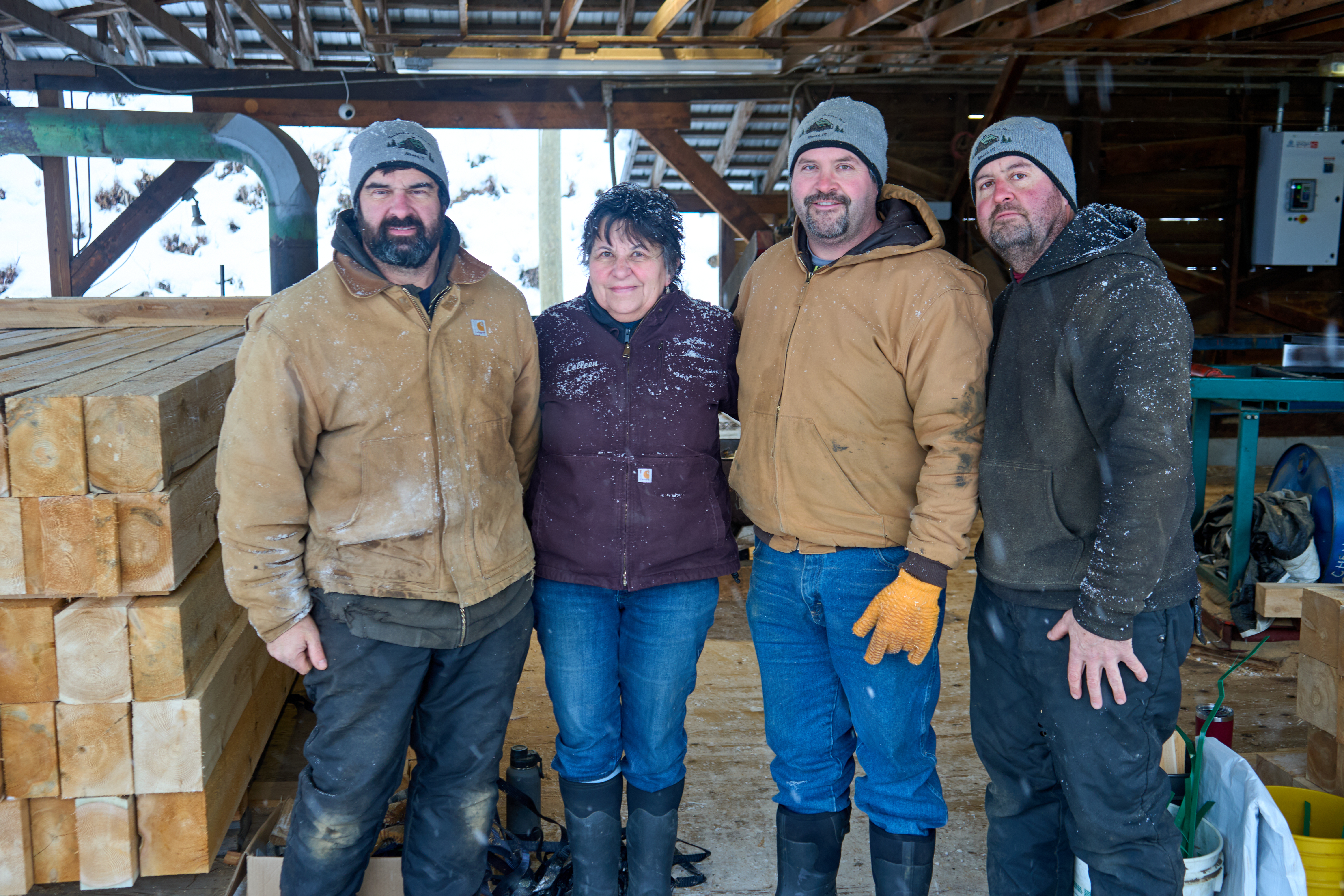 Doug, Colleen, Brian, and Mark of Goodridge Lumber stand in their sawmill