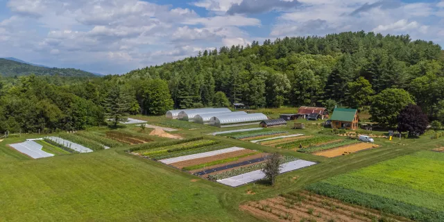 Drone shot of a Vermont farm, Ananda Gardens, in summer